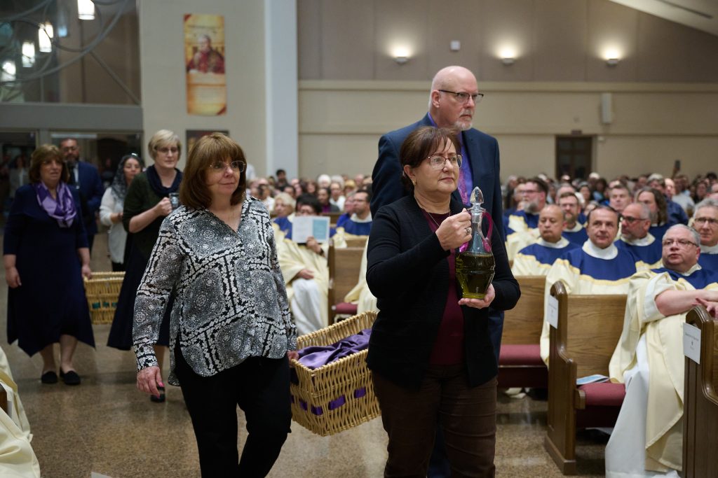 EASTER chrism mass bringing oils