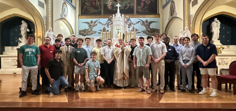 On Feast of the Sacred Heart, men discerning a priestly call gather for Mass with Bishop